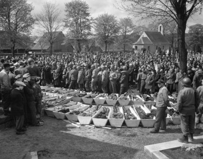 Chaplains of U.S. Third Army conducting burial services for 120 Russian and Polish Jews, victims of