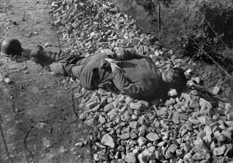 One of four Americans of U.S. 21st Infantry Regiment, captured night of July 9th, and shot thru