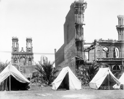 Refugee tents and damaged buildings from earthquake, Union Square Park, with synagogue on Sutter