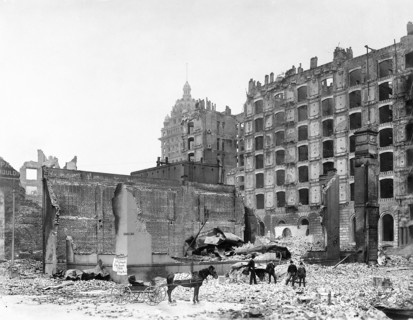 Damaged buildings at junction of Mission and New Montgomery Streets after earthquake, Palace Hotel