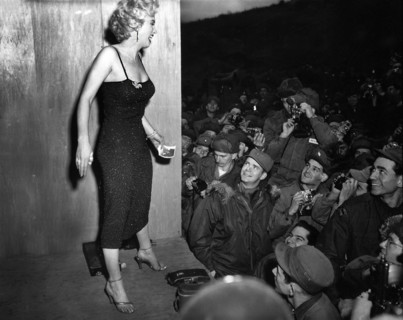 Marilyn Monroe, American motion picture actress, appearing with USO Camp Show, "Anything Goes,"