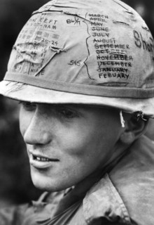 American sky trooper from 1st Cavalry Division (Airmobile) keeping track of time he has left on his