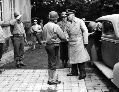 Major General Norman D. Cota greeting General George C. Marshall, U.S. Chief of Staff, on General