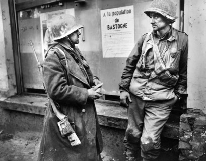 Two infantrymen of the 110th Regiment, 28th Division, U.S. 1st Army, (L-R) Private Adam H. Davis,