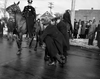 Police arresting rioter at Sojourner Truth Homes, a U.S. Federal Housing Project, caused by white