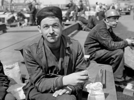 Factory worker on lunch break, Bethlehem-Fairfield shipyards, Baltimore, Maryland, USA, Arthur S.