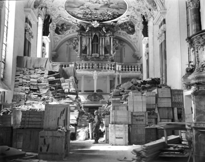 Troops of U.S. Third Army with German loot discovered in church, Ellingen, Germany, U.S. Army
