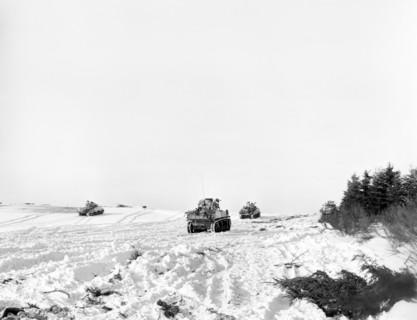 Tanks of U.S. 42nd Armored Battalion, moving into attack, Mabompre, Belgium,  U.S. Army Signal