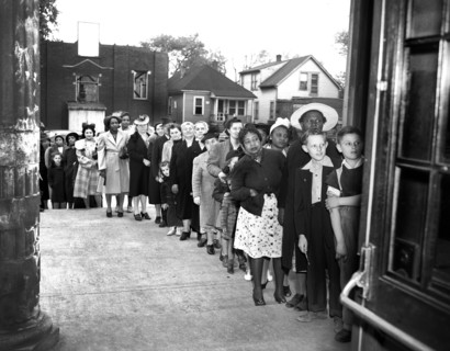 Group of people waiting in line at sugar rationing board, Detroit, Michigan, USA, Arthur S. Siegel,