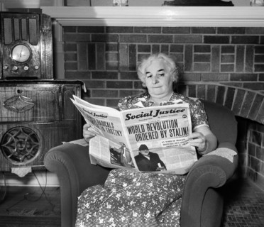 Elderly woman reading Social Justice newspaper published by Father Charles Coughlin, Royal Oak,