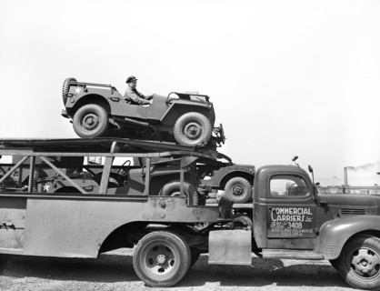 Close-up view of haulaway loaded with U.S. Army vehicles, Detroit, Michigan, USA, Arthur S. Siegel,