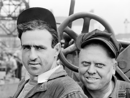 Head and shoulders portrait of two shipyard workers, Bethlehem-Fairfield shipyards, Baltimore,