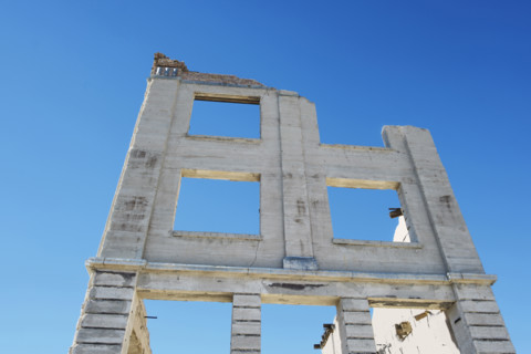 Low angle view of facade of the John S. Cook and Co. Bank in mining ghost town, Rhyolite, Nevada,