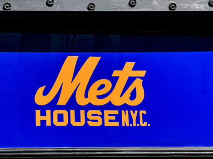 Mets House NYC, pop-up store and activities space, building exterior detail of blue and orange
