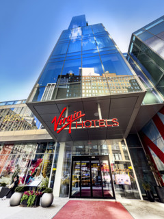 Virgin Hotel, low angle view of building exterior and entrance, New York City, New York, USA