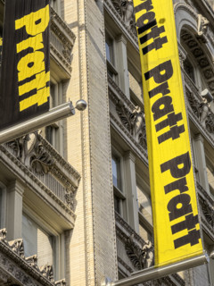 Pratt Institute, low angle view of building exterior and detail of school banners, West 14th