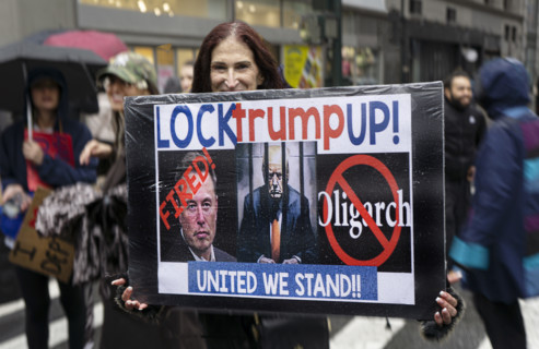 Demonstrators participating in "Hands Off" National Day of Action Protest, New York City, New York,