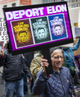 Demonstrators participating in "Hands Off" National Day of Action Protest, New York City, New York,