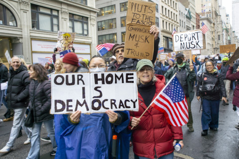 Demonstrators participating in "Hands Off" National Day of Action Protest, New York City, New York,