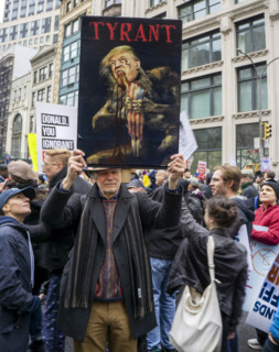 Demonstrators participating in "Hands Off" National Day of Action Protest, New York City, New York,
