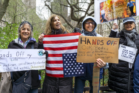 Demonstrators participating in "Hands Off" National Day of Action Protest, New York City, New York,