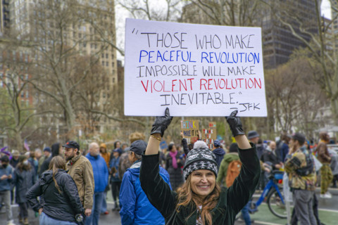 Demonstrators participating in "Hands Off" National Day of Action Protest, New York City, New York,