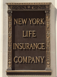 New York Life Insurance Company sign on New York Life building exterior, close-up detail, New York