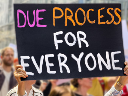 Demonstrators participating in "Our City, Our Fight: Protect Migrants, Protect the Planet" protest,