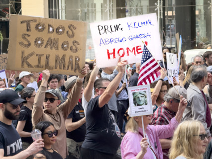 Demonstrators participating in "Our City, Our Fight: Protect Migrants, Protect the Planet" protest,