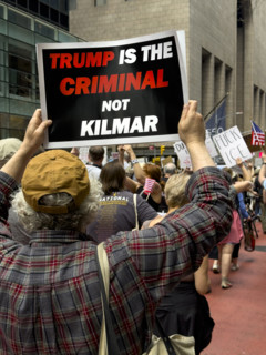 Demonstrators participating in "Our City, Our Fight: Protect Migrants, Protect the Planet" protest,