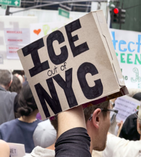 Demonstrators participating in "Our City, Our Fight: Protect Migrants, Protect the Planet" protest,
