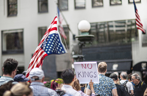 Demonstrators participating in "Our City, Our Fight: Protect Migrants, Protect the Planet" protest,