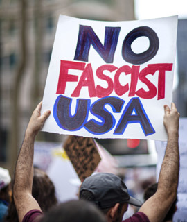 Demonstrators participating in "Our City, Our Fight: Protect Migrants, Protect the Planet" protest,