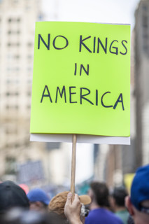 Demonstrators participating in "Our City, Our Fight: Protect Migrants, Protect the Planet" protest,