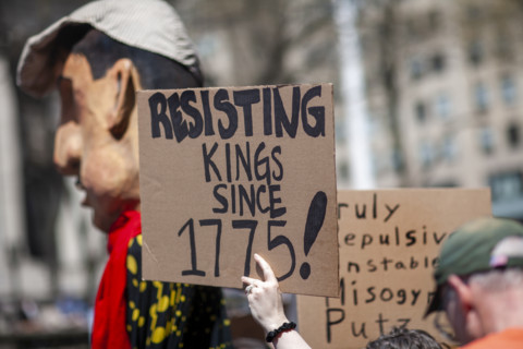 Demonstrators participating in "Our City, Our Fight: Protect Migrants, Protect the Planet" protest,