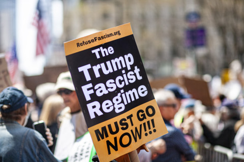 Demonstrators participating in "Our City, Our Fight: Protect Migrants, Protect the Planet" protest,