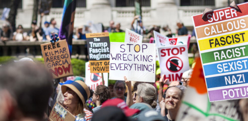 Demonstrators participating in "Our City, Our Fight: Protect Migrants, Protect the Planet" protest,
