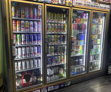 Selection of cold beer in grocery store