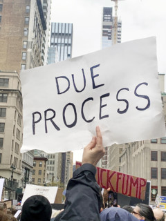 Demonstrators participating in "Hands Off" National Day of Action Protest, Fifth Avenue, New York