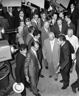 Soviet Premier Nikita Khrushchev and U.S. Vice President Richard M. Nixon pause in front of color