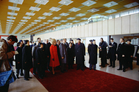 U.S. President Richard M. Nixon and U.S. First Lady Pat Nixon walk with Chinese Delegation into an