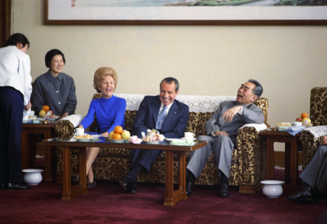 U.S. President Richard M. Nixon and U.S. First Lady Pat Nixon have Tea and Laugh while seated with