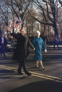 U.S. President George H.W. Bush and U.S. First Lady Barbara Bush walking along Pennsylvania Avenue