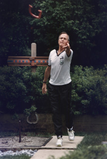 U.S. President George H.W. Bush participating in annual horseshoe tournament at the White House