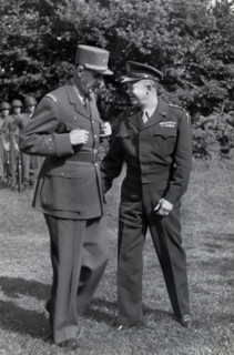 French General Charles de Gaulle, left, chatting with U.S. General Dwight D. Eisenhower during