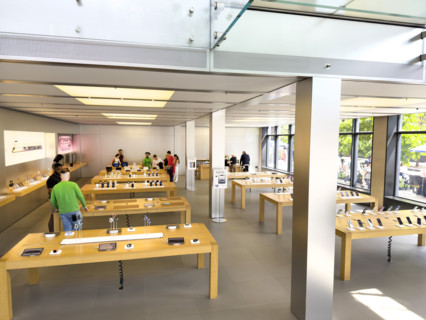 Customers shopping in Apple Store, West 14th Street, New York City