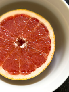High angle view of grapefruit half in bowl