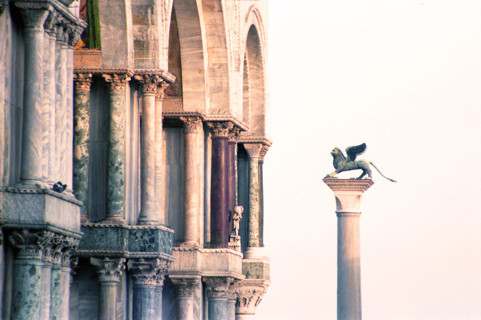 Column of San Marco is depicted with its winged lion, St. Mark's Square, Venice, Italy