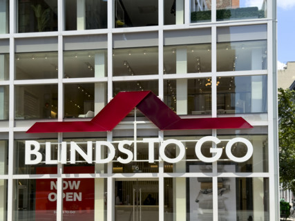 Blinds To Go retail store, company name and logo on building exterior, Seventh Avenue, Manhattan,