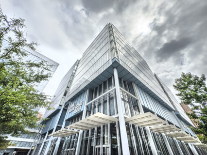 Jerome L. Greene Science Center, Columbia University, building exterior against ominous gray sky,